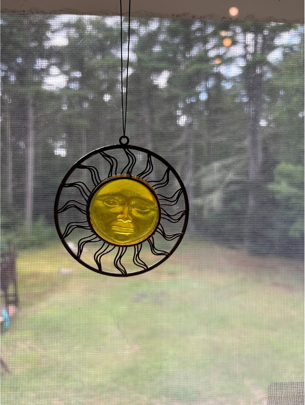 vintage celestial sun face inside a brass sunburst frame - 3”